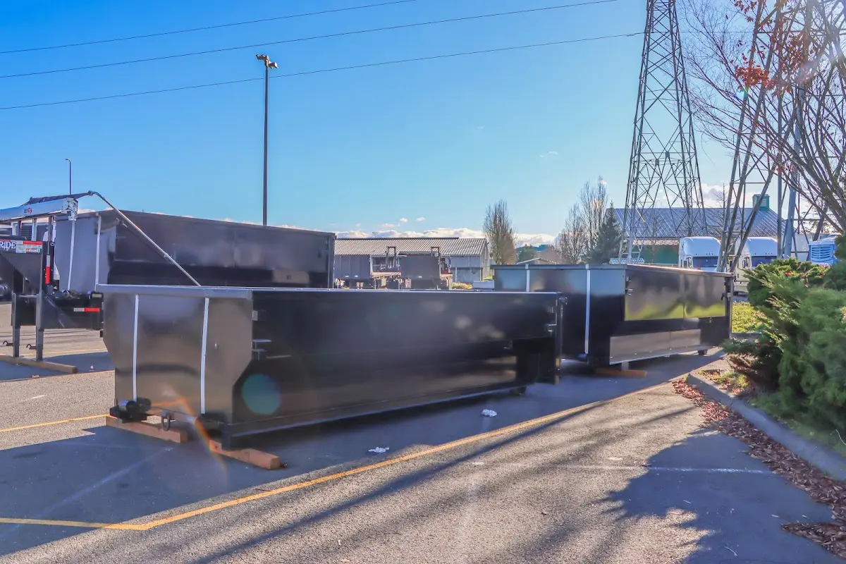Roll-off dumpster ready for waste disposal at job site for Roofing Dumpster Rental in Sevierville